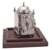An Edwardian silver Douglas clock, with engraved decoration,