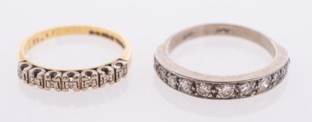 Two diamond set half eternity rings,