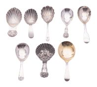 Eight various silver caddy spoons, one initialled, mixed patterns, makers & dates,