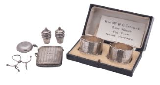 A small mixed lot of silver, to include a cased pair of napkin rings, initialled, a vesta case,