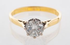 An 18ct gold diamond solitaire ring, hallmark rubbed,