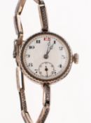 Rolex, a lady's silver wristwatch the round white dial having black and red Arabic numerals,