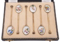 An Elizabeth II cased set of six silver-gilt & enamel coffee spoons,