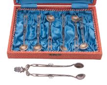 A cased set of six Turkish filigree silver spoons & matching sugar tongs,