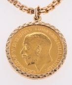 A mounted 1911 King George V half sovereign with a 9ct box link chain,