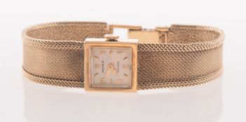 Rolex Precision, a lady's 9K gold wristwatch, the square dial with baton and Arabic numerals