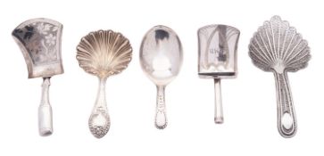 Five silver caddy spoons, to include a filigree example, two shovels,