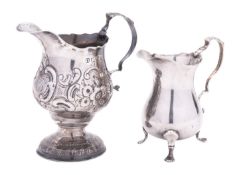 A George III silver cream jug, of baluster form, with chased and embossed decoration,