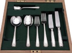 An Elizabeth II cased silver one-place canteen setting, Grecian Art Deco pattern,