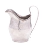 A George III silver cream jug, oval form, with reeded borders,