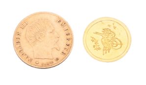 A Napoleon III gold 5 Franc piece, bare bust, reverse with value within wreath and dated 1860,