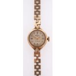 A lady's 9ct gold Rotary wristwatch, the silvered dial with gilt baton numerals,