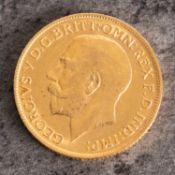 A George V sovereign, bare head, reverse with St. George and The Dragon and dated 1911