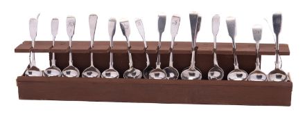 Seventeen 19th century Exeter silver salt spoons, the majority initialled, mixed makers,