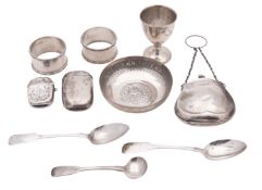 A mixed lot of silver, two napkin rings, an egg cup, a Far-Eastern coin dish, two teaspoons,