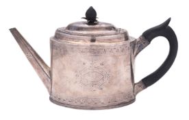 A George III silver teapot, oval form, with bright-cut engraved decoration,