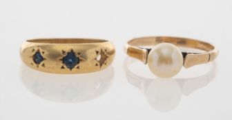 An 18ct gold sapphire set ring with one stone loss and a 9ct pearl set ring,