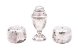 A pair of mid-20th century Danish silver salt & pepper shakers, by Henning Koppel, for Georg Jensen,