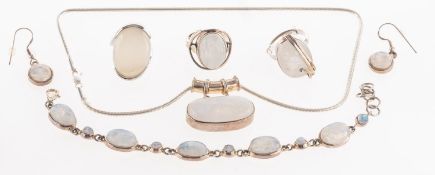 Two white metal and gemstone jewellery sets,