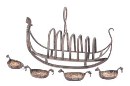 A Victorian set of four silver salts, in the form of a Viking Longship, with gilt interiors,