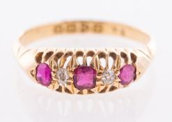 A ruby and diamond five stone ring, hallmarked for Chester 1913,