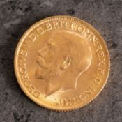 A George V sovereign, bare head, reverse with St George and The Dragon,