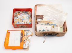 A box of stamps in albums and loose.