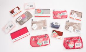 A group of thirteen small Kipling wallet