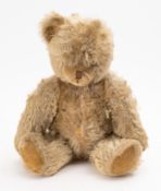 A 20th Century Mohair teddy bear. Having