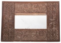 A relief carved oak framed rectangular w