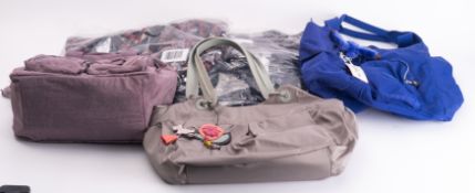 A group of six mainly Kipling handbags.