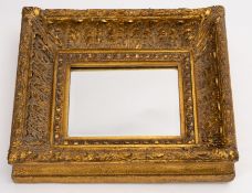 A gilt composition framed rectangular wa