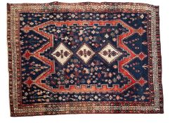 An Afshar rug, the indigo field with tri