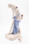 A Royal Worcester tinted parian figure of the Bather Surprised modelled after the original by
