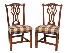 A pair of mahogany and later upholstered