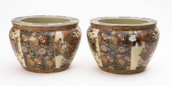 A pair of Chinese fish/bowl jardinieres,