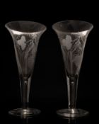 Pair of large ale glasses the trumpet shaped bowls engraved with hops and barley on a straight stem