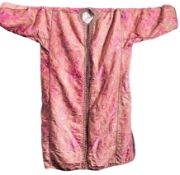 An Ottoman silk Entari [woman's robe] early 20th century with brocaded decoration on a pink ground,