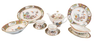 A Chinese porcelain tea and dinner service, comprising teapot, cups, saucers, dinner plates,
