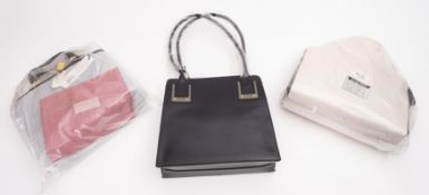 A trio of Radley leather handbags with b