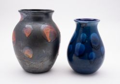 Two Poole pottery vases, the larger in t