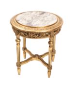 A gilt composition and marble topped cir