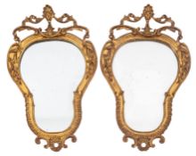 A pair of giltwood and composition wall
