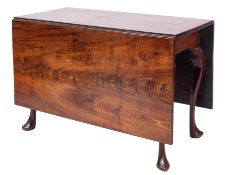A George II mahogany drop leaf dining ta