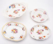 A group of early 19th century Coalport wares, circa 1830-40 painted with scattered flower sprays,