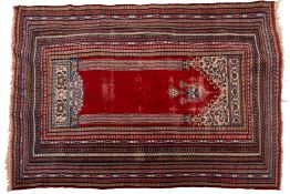 A Turkish style Rug, the wine pointed fi