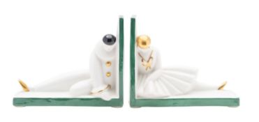 Robj Paris a pair of porcelain bookends modelled as a Pierrot and a Dancer, picked out in green,