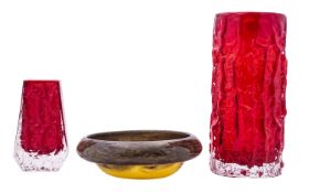 Three pieces of British art glass comprising a Whitefriars Bark vase in ruby red and a Coffin vase