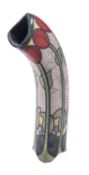 Tony White [b 1948] Tulips, a slab built raku fired vase of arcing form, 35cm high, captioned,