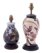 Two John Moorcroft pottery lamps comprising a Bramble pattern example after a design by Sally